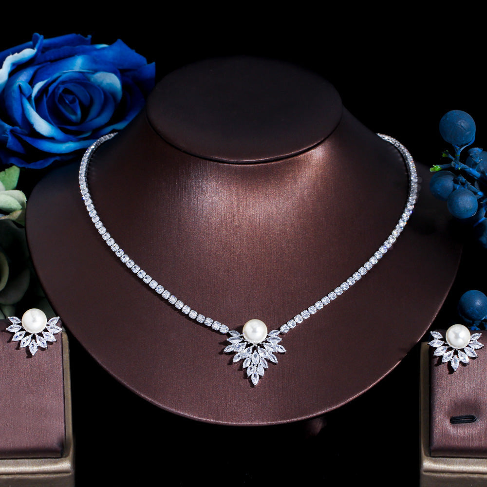Pearls with stones set